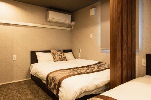 Apartamento Grand Base Urakami