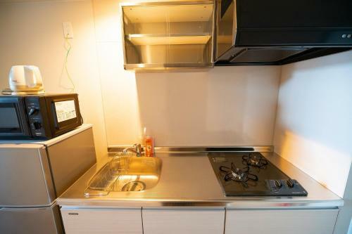 Apartamento Hotel Tomas Asahibashi Station