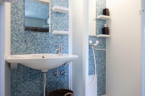 Apartamento Kokusai Street Garden Hotel