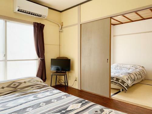 Apartamento Soleil Shinsaibashi