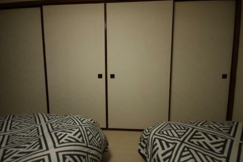 Apartamentos ????????? Sapporodome Front House
