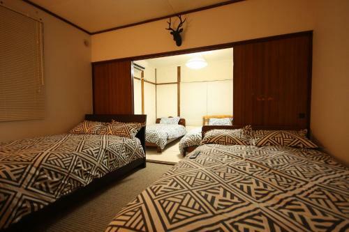 Apartamentos ????????? Sapporodome Front House