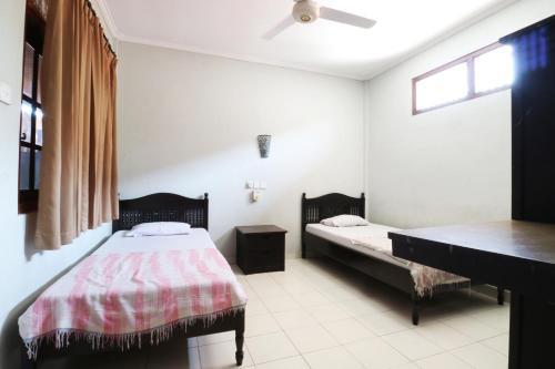 Hostal Taman Mekar Beach Inn