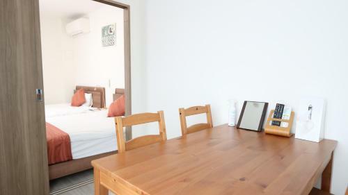 Apartamento Legatio Hakataekihigashi Hotel