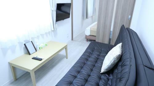 Apartamento Legatio Hakataekihigashi Hotel