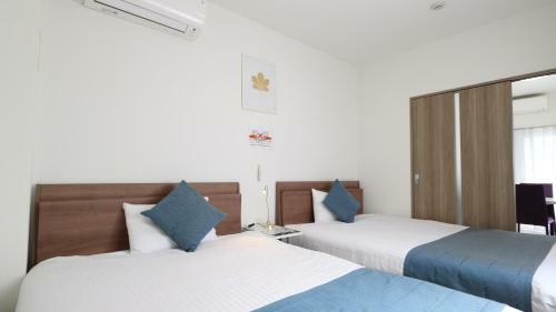 Apartamento Legatio Hakataekihigashi Hotel