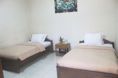 Hotel Taxa Inn Kuta Raya
