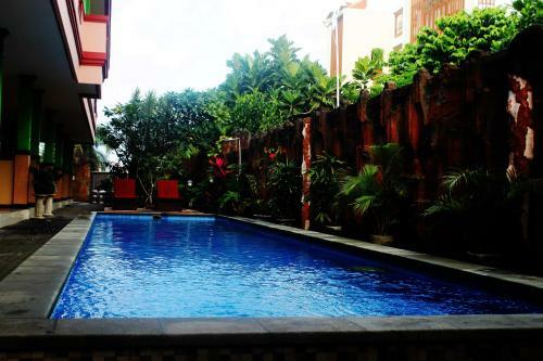 Hotel Taxa Inn Kuta Raya