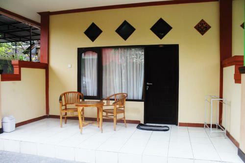 Hotel Taxa Inn Kuta Raya