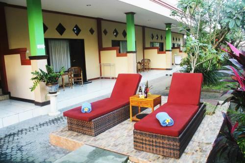 Hotel Taxa Inn Kuta Raya