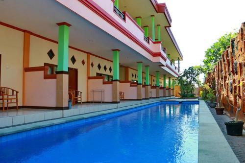 Hotel Taxa Inn Kuta Raya