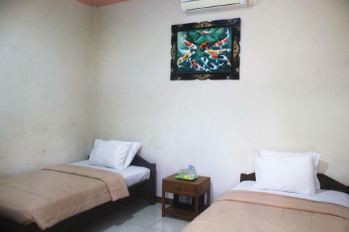Hotel Taxa Inn Kuta Raya