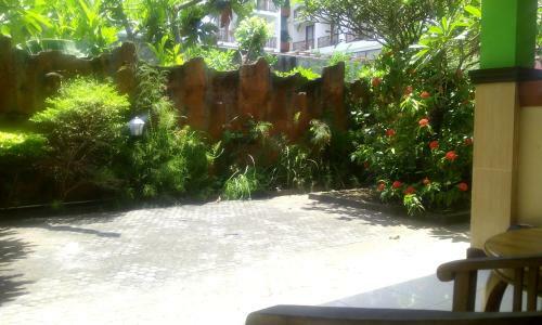 Hotel Taxa Inn Kuta Raya