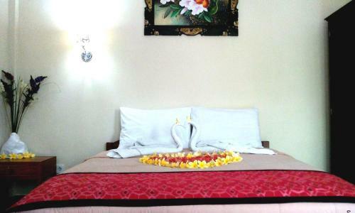 Hotel Taxa Inn Kuta Raya
