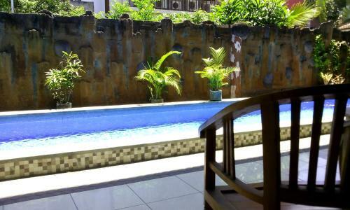 Hotel Taxa Inn Kuta Raya