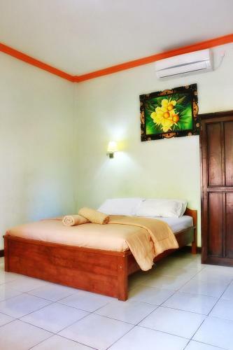 Hotel Taxa Inn Kuta Raya