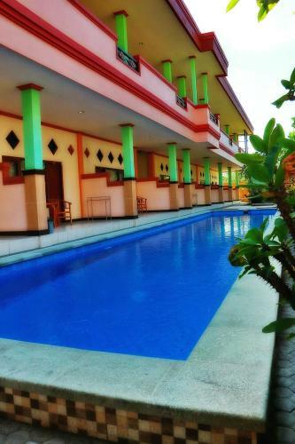 Hotel Taxa Inn Kuta Raya