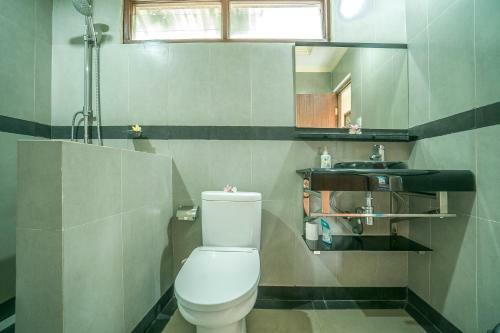 Hostal Three Dewi's Guest House