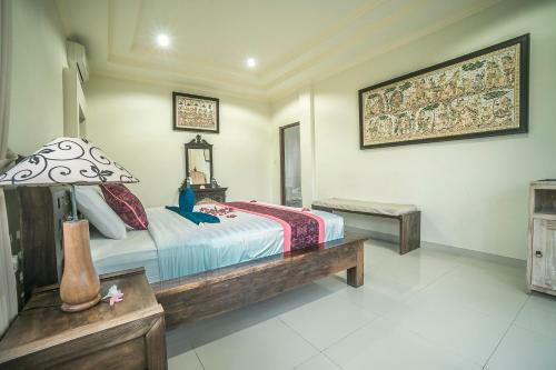Hostal Three Dewi's Guest House