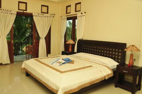 Hostal Three Dewi's Guest House