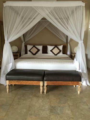 Hostal Frangipani Villas