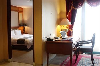 Hotel Travellers Suites Serviced Apartments