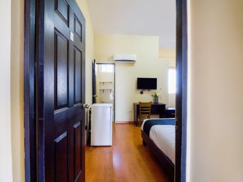 Hotel Capital O Ecohabit Monterrey