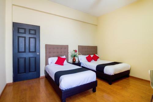 Hotel Capital O Ecohabit Monterrey