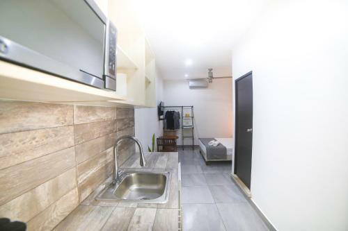 Apartamento Almond Suites