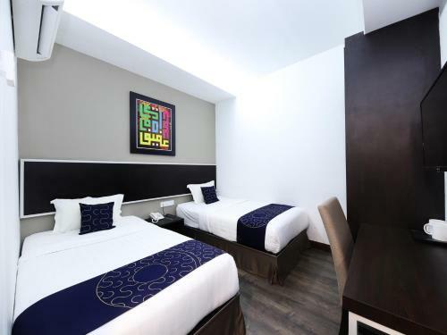 Capital O 978 Midaris Hotel