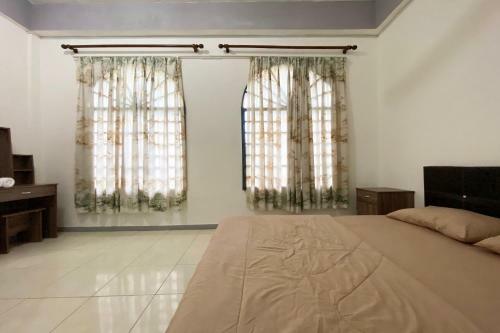 Hotel Oyo 90212 Anna Kota Apartment