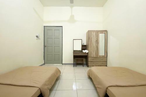 Hotel Oyo 90212 Anna Kota Apartment