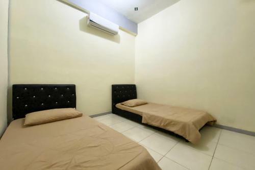 Hotel Oyo 90212 Anna Kota Apartment