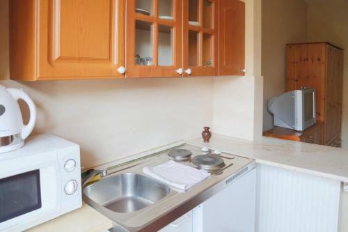 Hostal R�zsakert Apartmanh�z