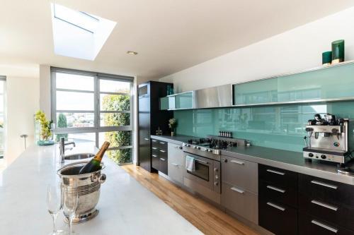Designer Three Bedroom Home With Harbour Views