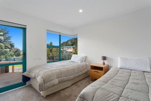 The Lights House - Beachfront Ohope Holiday Home