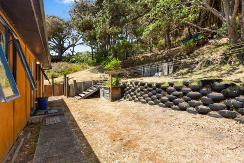 The Big Round Window - Raglan Holiday Home