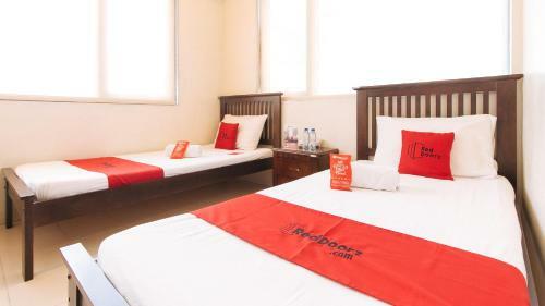 Hotel Reddoorz Plus @ E Rodriguez Corner Banawe