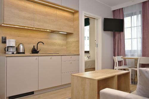 Apartamenty ?winouj?cie - Kwarta? R�?y Wiatr�w II