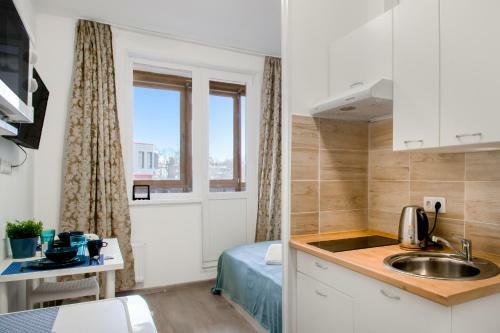 Apartments At Skolkovskaya / New Day