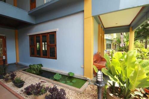 Hostal Palm House Resort ???????