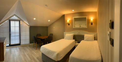 Apartamento White Golden Suite Hotel