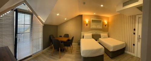 Apartamento White Golden Suite Hotel
