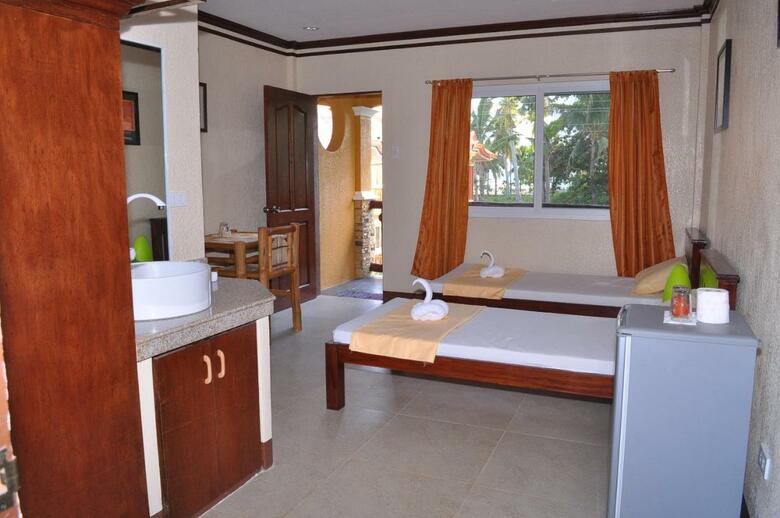 Hotel Slam's Garden Resort