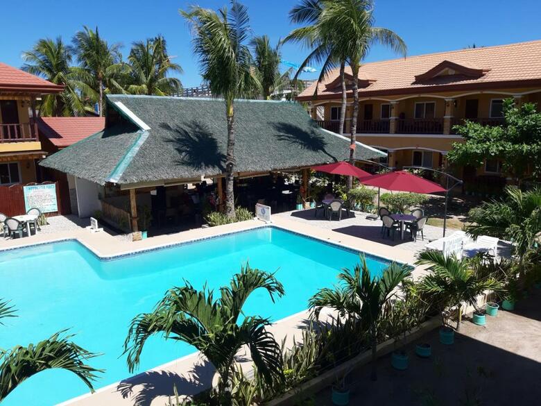 Hotel Slam's Garden Resort