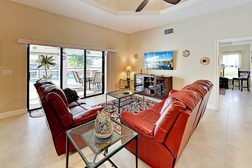 Canal-front Getaway - Boat Dock & Heated Pool Home