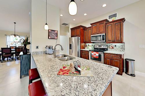 Canal-front Getaway - Boat Dock & Heated Pool Home