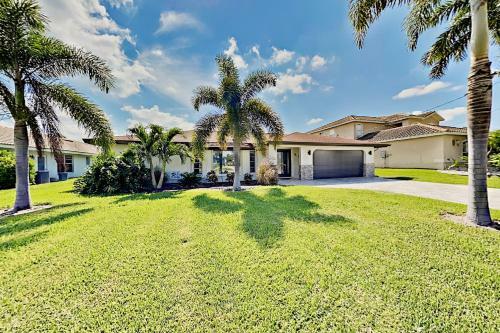 Chic Canal-front Home - Heated Pool, Private Dock Home