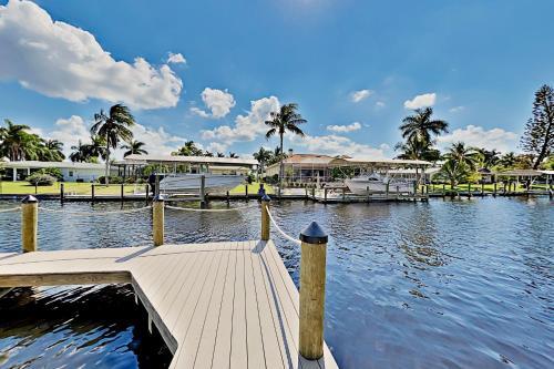 Chic Canal-front Home - Heated Pool, Private Dock Home