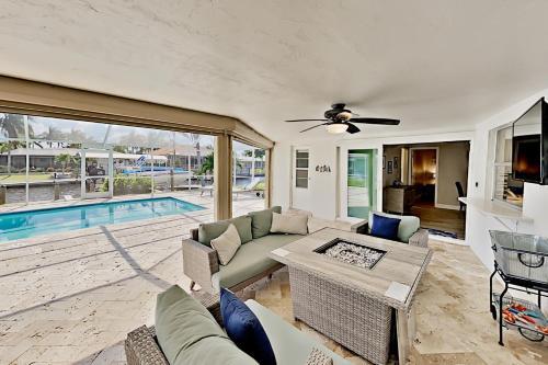 Chic Canal-front Home - Heated Pool, Private Dock Home